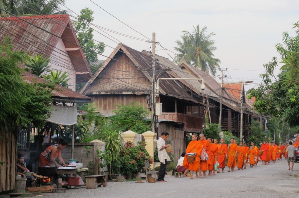 Monks collecting alms